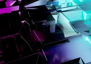 A professional's hand using a digital device for responsive web design.